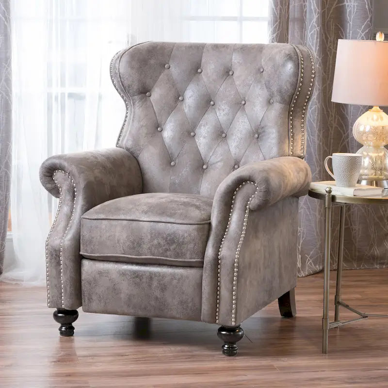 Fauteuil inclinable à dossier capitonné et accoudoirs arrondis, profitez d'un confort cocooning