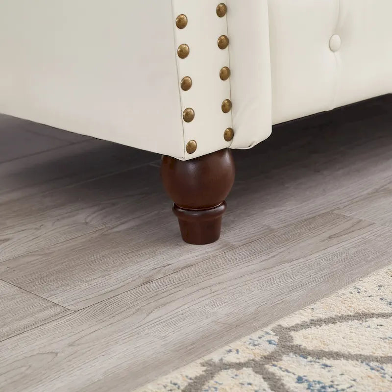 Canapé 3 places en cuir technique de 217,9 cm avec dossier capitonné et rangement